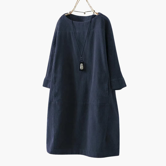 Women’s tunic dress with crew neckline and patch pockets
