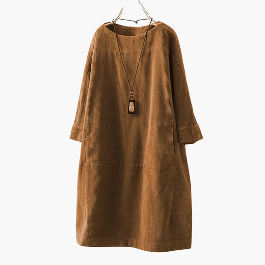Women’s tunic dress with crew neckline and patch pockets